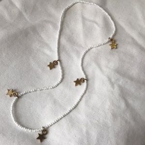 White beaded star charm choker